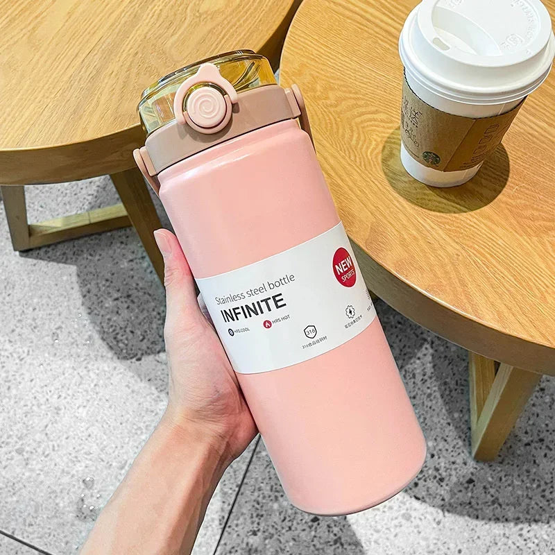 Gourde isotherme rose 1L/1.2L en inox avec paille